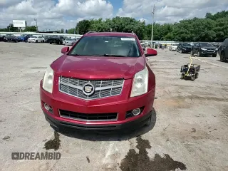 2012 Cadillac SRX Performance Collection with VIN 3GYFNBE39CS655341, listed as a Copart auction lot 62350625 with 156,043 mi miles and Salvage title. Bid and sale history available at DreamBid. Image 14.