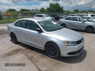 2014 Volkswagen Jetta TDI w/Premium with VIN 3VWLL7AJ3EM310052, listed as a IAAI auction lot 42614991 with 134,235 mi miles and . Bid and sale history available at DreamBid. Image 1.
