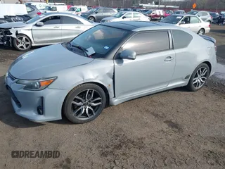 2014 Scion tC z VIN JTKJF5C71E3081033, wystawiony jako IAAI lot #41928949 z przebiegiem 144 112 mil mil oraz . Historia ofert i sprzedaży dostępna na DreamBid. Obrazek 2.