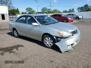 2004 Toyota Camry LE z VIN JTDBE32K640270298, wystawiony jako Copart lot #58800955 z przebiegiem 79 064 mil mil oraz Szkoda całkowita • Salvage title. Historia ofert i sprzedaży dostępna na DreamBid. Obrazek 4.