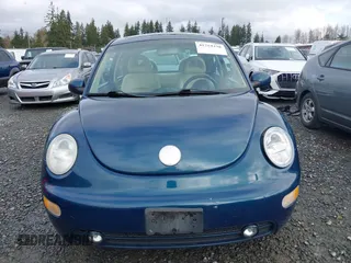 2002 Volkswagen New Beetle Coupe GLS with VIN 3VWCD21C52M427614, listed as a IAAI auction lot 41754238 with 194,718 mi miles. Bid and sale history available at carsss.com. Image 12.