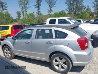 2011 Dodge Caliber Mainstreet with VIN 1B3CB3HAXBD107494, listed as a IAAI auction lot 42071328 with 146,936 mi miles. Bid and sale history available at carsss.com. Image 14.