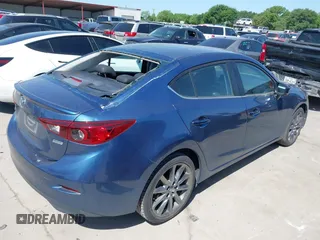 2018 Mazda 3 Touring with VIN 3MZBN1V38JM206827, listed as a IAAI auction lot 41983631 with 51,303 mi miles and . Bid and sale history available at DreamBid. Image 4.
