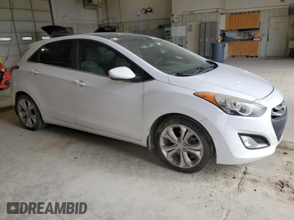2014 Hyundai Elantra GT with VIN KMHD35LH1EU165767, listed as a Copart auction lot 53121305 with 111,523 mi miles and Salvage Title. Bid and sale history available at carsss.com. Image 4.