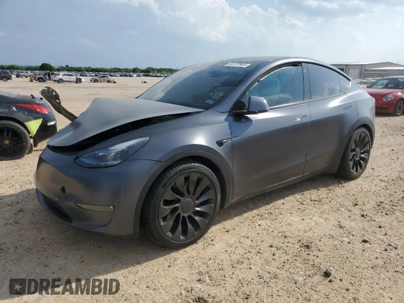 2022 Tesla Model Y Performance with VIN 7SAYGDEF2NF460730, listed as a Copart auction lot 54127945 with 59,735 mi miles and Salvage title. Bid and sale history available at DreamBid. Image 1.