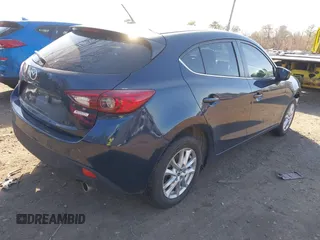 2016 Mazda 3 i Sport with VIN JM1BM1K74G1324098, listed as a IAAI auction lot 41700049 with 28,539 mi miles and . Bid and sale history available at DreamBid. Image 4.