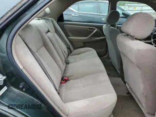 2000 Toyota Camry CE z VIN 4T1BG22K4YU977012, wystawiony jako Copart lot #59085085 z przebiegiem 146 838 mil mil oraz Szkoda całkowita • Salvage title. Historia ofert i sprzedaży dostępna na DreamBid. Obrazek 10.