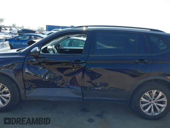2018 Volkswagen Tiguan S with VIN 3VV1B7AX7JM092033, listed as a IAAI auction lot 42373619 with 124,775 mi miles and . Bid and sale history available at DreamBid. Image 14.