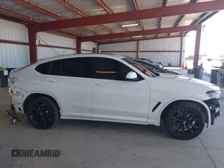 2024 BMW X4 xDrive30i with VIN 5UX33DT00R9U63349, listed as a IAAI auction lot 42322299 with 23,526 mi miles and . Bid and sale history available at DreamBid. Image 14.