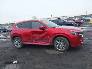 2023 Mazda CX-5 Signature with VIN JM3KFBXY3P0282456, listed as a IAAI auction lot 41542915 with 3,376 mi miles and . Bid and sale history available at carsss.com. Image 13.