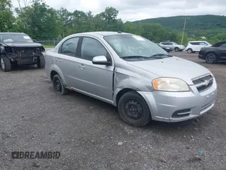 2009 Chevrolet Aveo 1LT z VIN KL1TD56E39B643484, wystawiony jako IAAI lot #42359233 z przebiegiem 88 974 mil mil oraz . Historia ofert i sprzedaży dostępna na DreamBid. Obrazek 1.