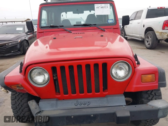 1998 Jeep Wrangler SE with VIN 1J4FY29P2WP791317, listed as a IAAI auction lot 41748523 with 169,052 mi miles. Bid and sale history available at carsss.com. Image 12.