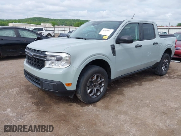 2023 Ford Maverick XL with VIN 3FTTW8E33PRA57039, listed as a IAAI auction lot 42120953 with 18,336 mi miles and . Bid and sale history available at DreamBid. Image 2.
