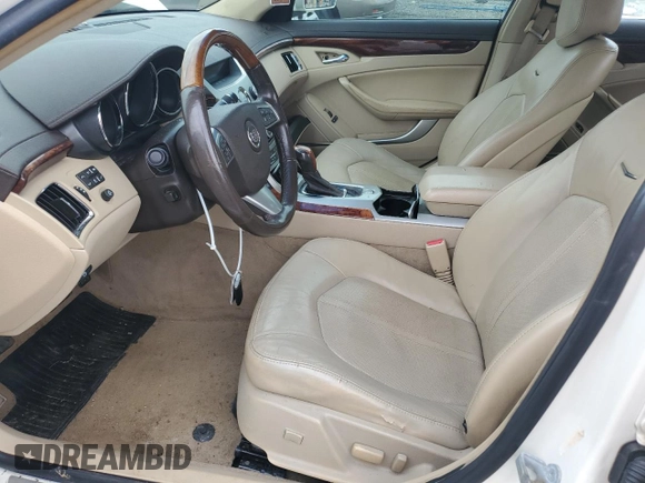 2012 Cadillac CTS Premium with VIN 1G6DS5E35C0107306, listed as a Copart auction lot 57486615 with 149,012 mi miles and Salvage title. Bid and sale history available at DreamBid. Image 7.