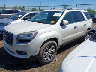 2014 GMC Acadia SLT z VIN 1GKKRRKD3EJ219690, wystawiony jako IAAI lot #42221261 z przebiegiem 103 675 mil mil oraz . Historia ofert i sprzedaży dostępna na DreamBid. Obrazek 2.