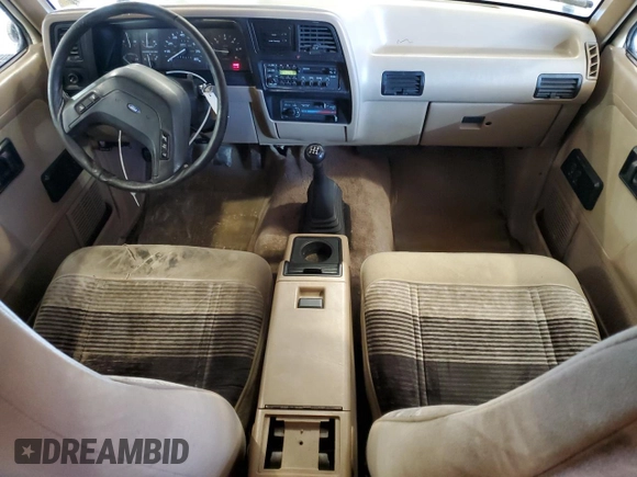 1990 Ford Bronco z VIN 1FMCU14T9LUA62663, wystawiony jako Copart lot #85040114 z przebiegiem 9 963 mil mil oraz Czysty tytuł • Clean title. Historia ofert i sprzedaży dostępna na DreamBid. Obrazek 8.