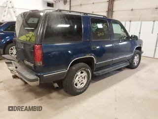 1999 Chevrolet Tahoe Z71 with VIN 1GNEK13R5XJ548832, listed as a IAAI auction lot 42077245 with 208,875 mi miles and . Bid and sale history available at DreamBid. Image 4.