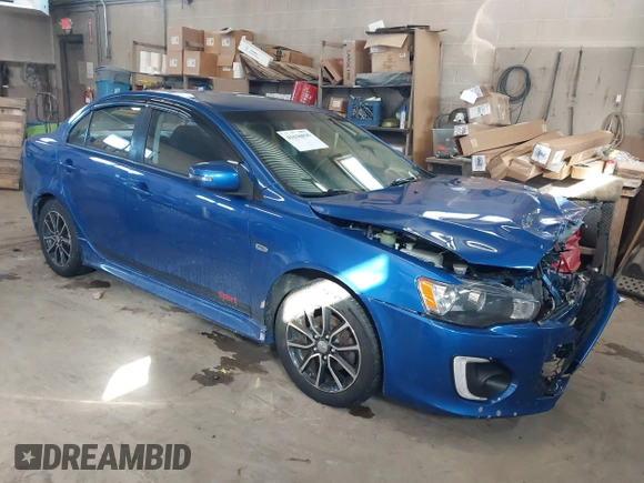 2017 Mitsubishi Lancer ES with VIN JA32V2FW4HU006890, listed as a IAAI auction lot 41636035 with 165,077 mi miles. Bid and sale history available at carsss.com. Image 1.