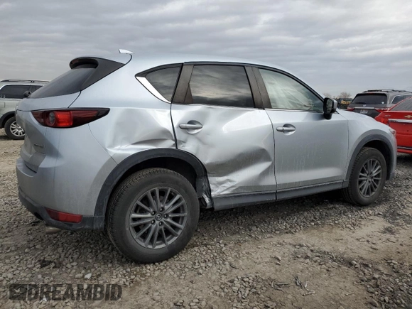 2021 Mazda CX-5 Touring with VIN JM3KFACM9M0409414, listed as a Copart auction lot 89071495 with 43,896 mi miles and Salvage Title. Bid and sale history available at carsss.com. Image 3.
