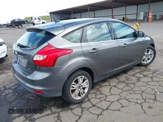 2012 Ford Focus SEL with VIN 1FAHP3M29CL314685, listed as a IAAI auction lot 41974881 with 167,119 mi miles. Bid and sale history available at carsss.com. Image 4.