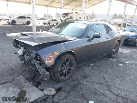 2021 Dodge Challenger GT with VIN 2C3CDZKG4MH677574, listed as a IAAI auction lot 41460036 with 67,170 mi miles. Bid and sale history available at carsss.com. Image 16.