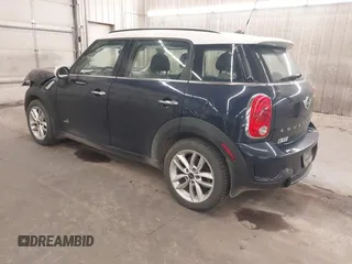 2014 MINI Countryman S with VIN WMWZC5C56EWP38017, listed as a IAAI auction lot 42287308 with 151,780 mi miles and . Bid and sale history available at DreamBid. Image 3.