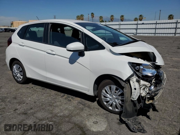2020 Honda Fit LX with VIN 3HGGK5H49LM720025, listed as a Copart auction lot 52760585 with 140,762 mi miles and Salvage title. Bid and sale history available at DreamBid. Image 4.