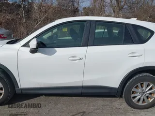 2013 Mazda CX-5 Sport with VIN JM3KE4BE5D0165212, listed as a IAAI auction lot 41332056 with 150,301 mi miles. Bid and sale history available at carsss.com. Image 15.