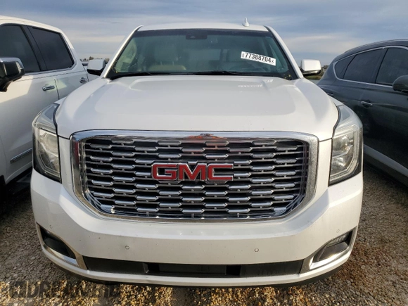 2019 GMC Yukon Denali with VIN 1GKS1CKJXKR220567, listed as a Copart auction lot 77388704 with 38,955 mi miles and Non Repairable. Bid and sale history available at carsss.com. Image 5.