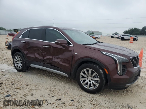 2023 Cadillac XT4 FWD Premium Luxury with VIN 1GYFZCR48PF100078, listed as a Copart auction lot 55955865 with 23,509 mi miles and Salvage title. Bid and sale history available at DreamBid. Image 4.