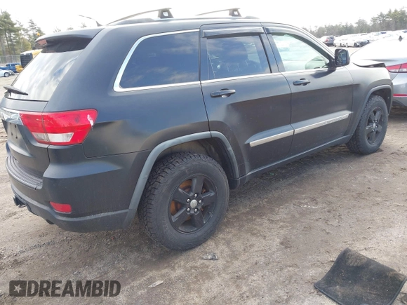 2011 Jeep Grand Cherokee Laredo with VIN 1J4RR4GG5BC670369, listed as a IAAI auction lot 41892892 with 164,807 mi miles and . Bid and sale history available at DreamBid. Image 4.