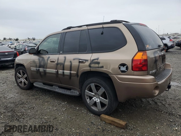 2003 GMC Envoy SLE with VIN 1GKDT13S432263407, listed as a Copart auction lot 44025825 with 154,266 mi miles and Salvage Title. Bid and sale history available at carsss.com. Image 2.