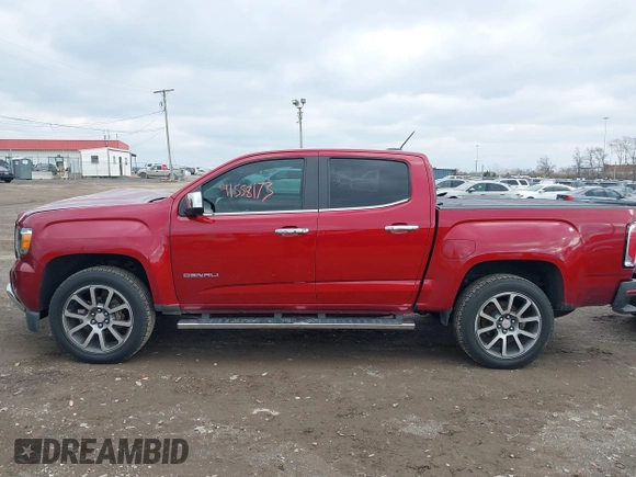 2018 GMC Canyon 4WD Denali with VIN 1GTG6EEN4J1317399, listed as a IAAI auction lot 41558173 with 87,647 mi miles. Bid and sale history available at carsss.com. Image 14.