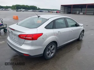 2017 Ford Focus SE with VIN 1FADP3FEXHL283329, listed as a IAAI auction lot 42347751 with 85,337 mi miles and . Bid and sale history available at DreamBid. Image 4.