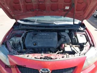 2009 Toyota Corolla with VIN 1NXBU40E09Z098951, listed as a IAAI auction lot 42090512 with 199,787 mi miles. Bid and sale history available at carsss.com. Image 10.