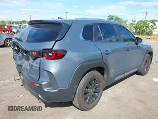 2024 Mazda CX-50 S Premium z VIN 7MMVABDM7RN160582, wystawiony jako IAAI lot #42312189 z przebiegiem 43 210 mil mil oraz . Historia ofert i sprzedaży dostępna na DreamBid. Obrazek 4.