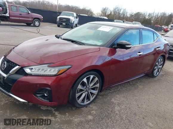2020 Nissan Maxima Platinum with VIN 1N4AA6FV1LC377694, listed as a IAAI auction lot 40997776 with 14,321 mi miles and . Bid and sale history available at DreamBid. Image 2.