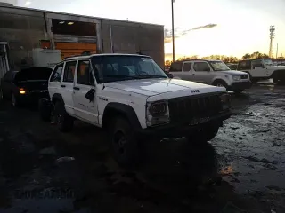 1995 Jeep Cherokee SE с VIN 1J4FT28S1SL634660, выставлен на аукционе Copart как лот 41530075 с пробегом Не указан миль и Списание • Salvage title. История ставок и продаж доступна на DreamBid. Изображение 11.