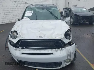 2011 MINI Countryman S z VIN WMWZC5C54BWM10154, wystawiony jako IAAI lot #37722183 z przebiegiem Nie podano mil oraz . Historia ofert i sprzedaży dostępna na DreamBid. Obrazek 11.