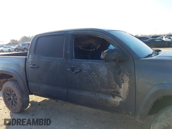 2021 Toyota Tacoma SR z VIN 5TFCZ5AN3MX272033, wystawiony jako IAAI lot #41689129 z przebiegiem Nie podano mil oraz . Historia ofert i sprzedaży dostępna na DreamBid. Obrazek 13.