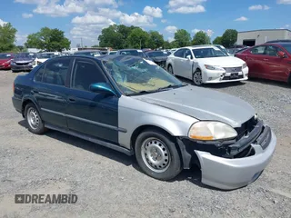 1997 Honda Civic LX z VIN 2HGEJ667XVH508555, wystawiony jako IAAI lot #39561840 z przebiegiem 185 447 mil mil oraz . Historia ofert i sprzedaży dostępna na DreamBid. Obrazek 1.
