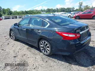 2017 Nissan Altima SV with VIN 1N4AL3AP0HC144575, listed as a IAAI auction lot 40129580 with 184,765 mi miles and . Bid and sale history available at DreamBid. Image 3.