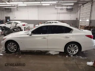 2015 Infiniti Q50 Premium z VIN JN1BV7AR0FM417283, wystawiony jako IAAI lot #41579549 z przebiegiem 112 407 mil mil oraz . Historia ofert i sprzedaży dostępna na DreamBid. Obrazek 15.
