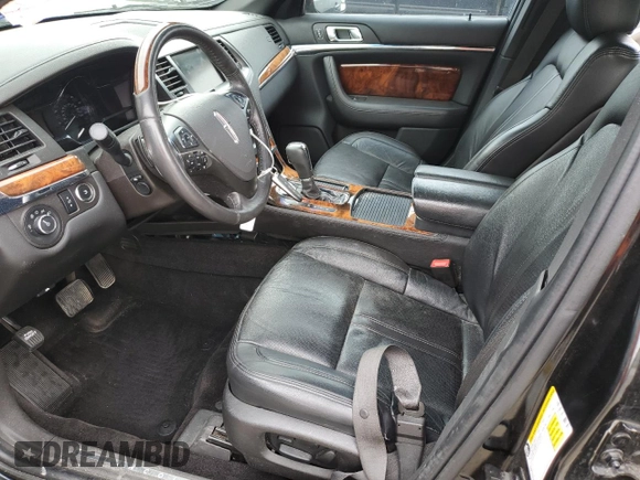2015 Lincoln MKS z VIN 1LNHL9DK6FG604609, wystawiony jako Copart lot #56243135 z przebiegiem 82 622 mil mil oraz Szkoda całkowita • Salvage title. Historia ofert i sprzedaży dostępna na DreamBid. Obrazek 7.