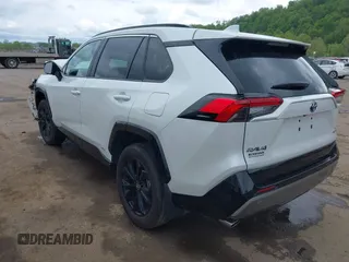 2024 Toyota RAV4 Hybrid SE with VIN 2T3T6RFV3RW066117, listed as a IAAI auction lot 42198742 with 12,352 mi miles and . Bid and sale history available at DreamBid. Image 3.
