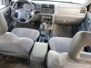 1999 Isuzu Rodeo S with VIN 4S2CK58W0X4378100, listed as a Copart auction lot 78462184 with Not provided miles and Salvage title. Bid and sale history available at DreamBid. Image 8.