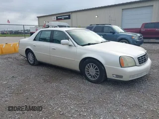 2003 Cadillac DeVille DHS z VIN 1G6KE54Y23U267695, wystawiony jako IAAI lot #42500344 z przebiegiem 317 819 mil mil oraz . Historia ofert i sprzedaży dostępna na DreamBid. Obrazek 1.