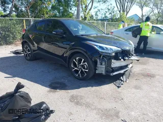 2021 Toyota C-HR LE with VIN NMTKHMBX7MR126165, listed as a IAAI auction lot 41848045 with 26,882 mi miles. Bid and sale history available at carsss.com. Image 1.