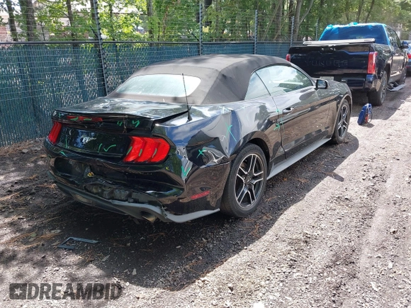 2018 Ford Mustang EcoBoost Premium z VIN 1FATP8UH4J5117856, wystawiony jako IAAI lot #42675106 z przebiegiem 110 587 mil mil oraz . Historia ofert i sprzedaży dostępna na DreamBid. Obrazek 4.