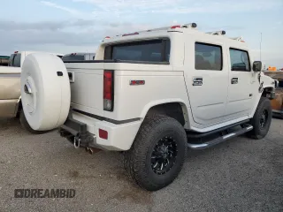 2006 Hummer H2 with VIN 5GRGN22U56H105928, listed as a Copart auction lot 76692904 with 0 mi miles and Salvage Title. Bid and sale history available at carsss.com. Image 3.